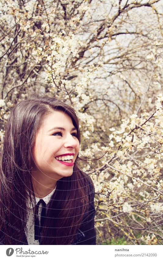 Young happy woman posing close to a blossoming tree Lifestyle Style Joy Wellness Human being Feminine Young woman Youth (Young adults) 1 18 - 30 years Adults