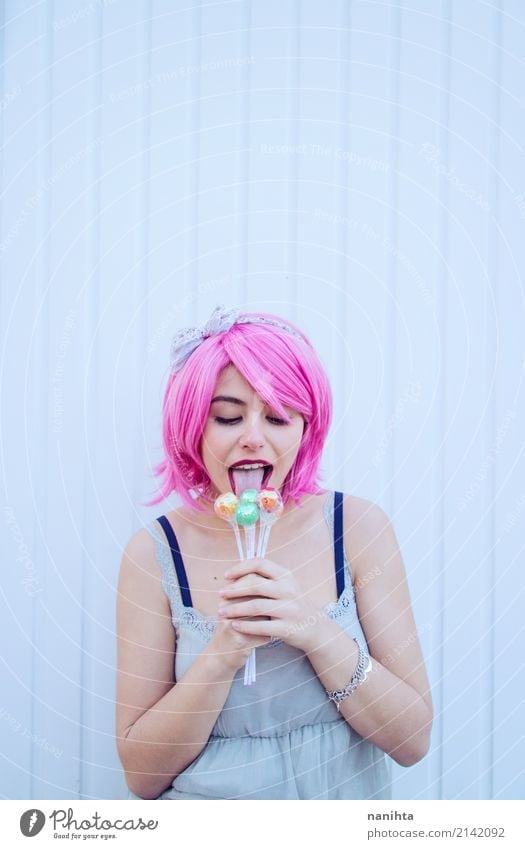 Young woman with pink hair is licking lollipops Food Candy Eating Lifestyle Joy Beautiful Wellness Feasts & Celebrations Human being Feminine