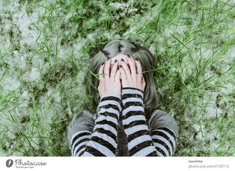 Young woman covering her face with her hands Human being Feminine Youth (Young adults) 1 18 - 30 years Adults Environment Nature Spring Grass Pollen