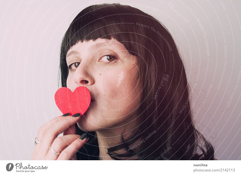 Young woman kissing a heart Beautiful Feasts & Celebrations Valentine's Day Mother's Day Human being Feminine Youth (Young adults) 1 18 - 30 years Adults