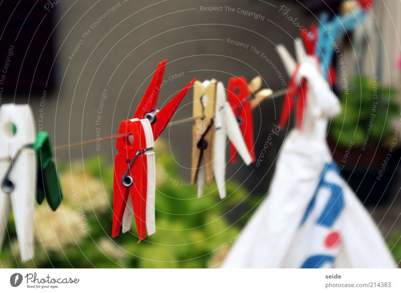 wash the laundry Clothes peg Clothesline Infinity Blue Multicoloured Yellow Red White Colour photo Exterior shot Macro (Extreme close-up) Day