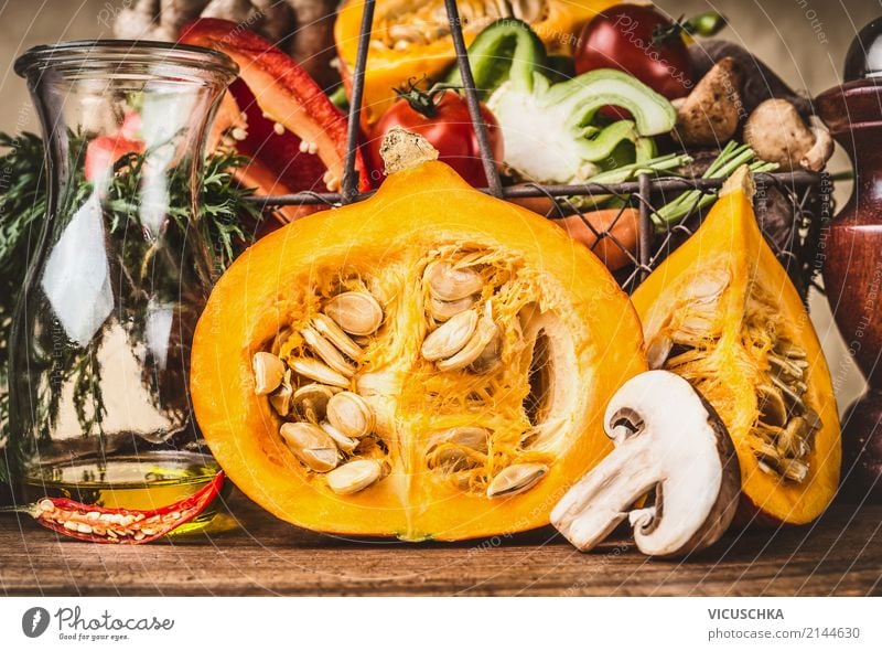 Half pumpkin with seeds and other vegetarian ingredients Food Vegetable Soup Stew Herbs and spices Nutrition Dinner Organic produce Vegetarian diet Diet Style