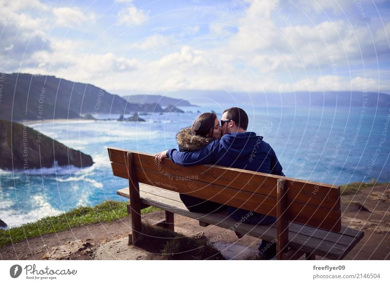A couple kissing in "the best bench in the world" Vacation & Travel Tourism Trip Winter Mountain Hiking Human being Masculine Feminine Woman Adults Man