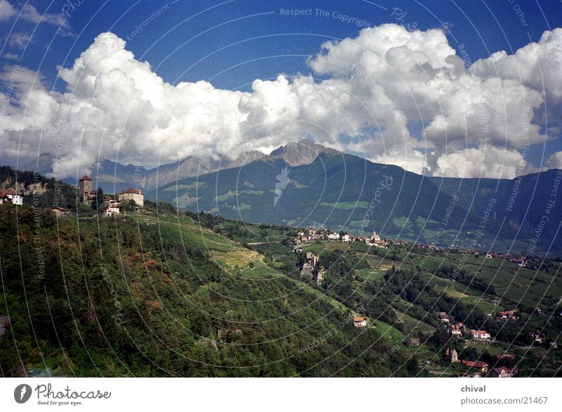 Tyrol village Village South Tyrol Clouds Panorama (View) Cumulus Mountain Alps Thunder and lightning Castle Large