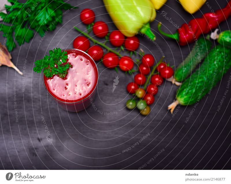 Tomato juice in a glass Vegetable Herbs and spices Vegetarian diet Diet Cold drink Juice Glass Kitchen Wood Fresh Green Red Black Cherry pepper background
