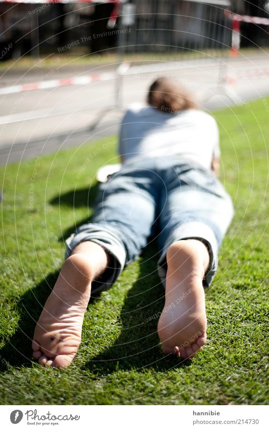 relaxation Human being Masculine Young man Youth (Young adults) 1 18 - 30 years Adults Street Contentment Serene Calm Vienna Lie Relaxation Barefoot Meadow