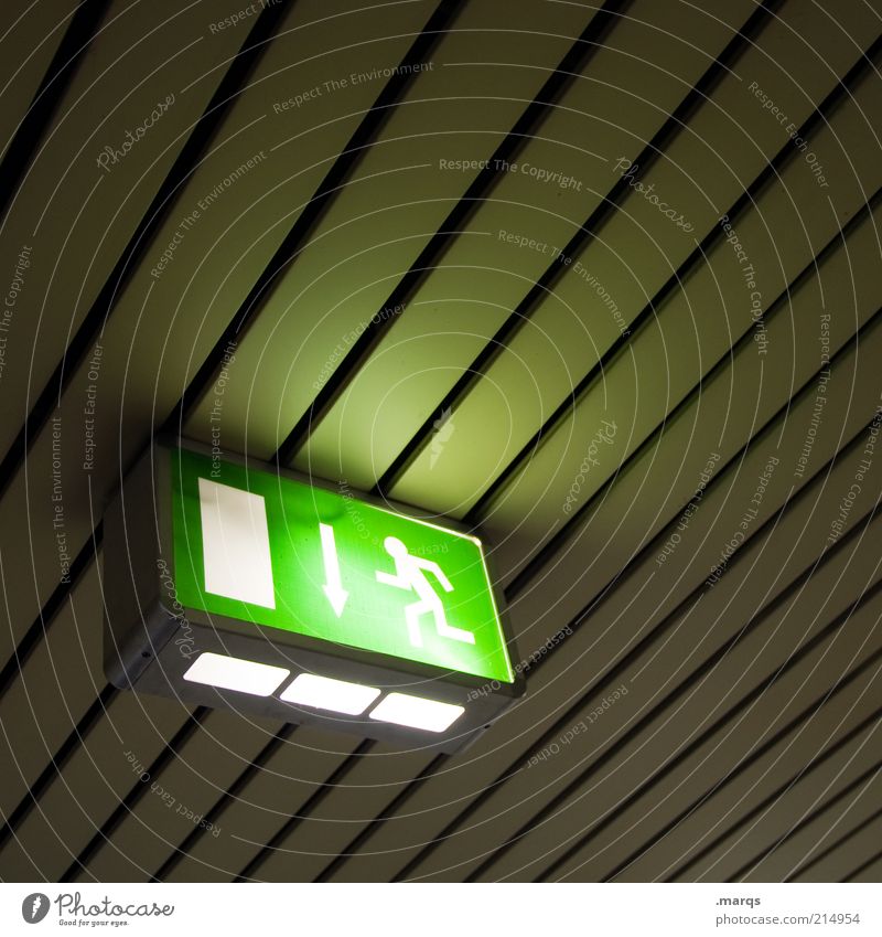 escape Design Ceiling Emergency exit Sign Signage Warning sign Line Running Illuminate Dark Simple Above Perspective Flee Pictogram Colour photo Interior shot