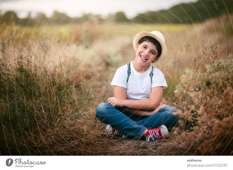 Happy child in the field Lifestyle Children's game Adventure Human being Masculine Toddler Infancy 1 3 - 8 years Nature Meadow Field To enjoy Smiling Laughter