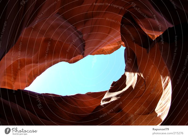 ray of hope Nature Sky Rock Canyon Blue Brown Colour photo Exterior shot Day Shadow Worm's-eye view Antelope Canyon Vista Esthetic Cave Sandstone Rock formation