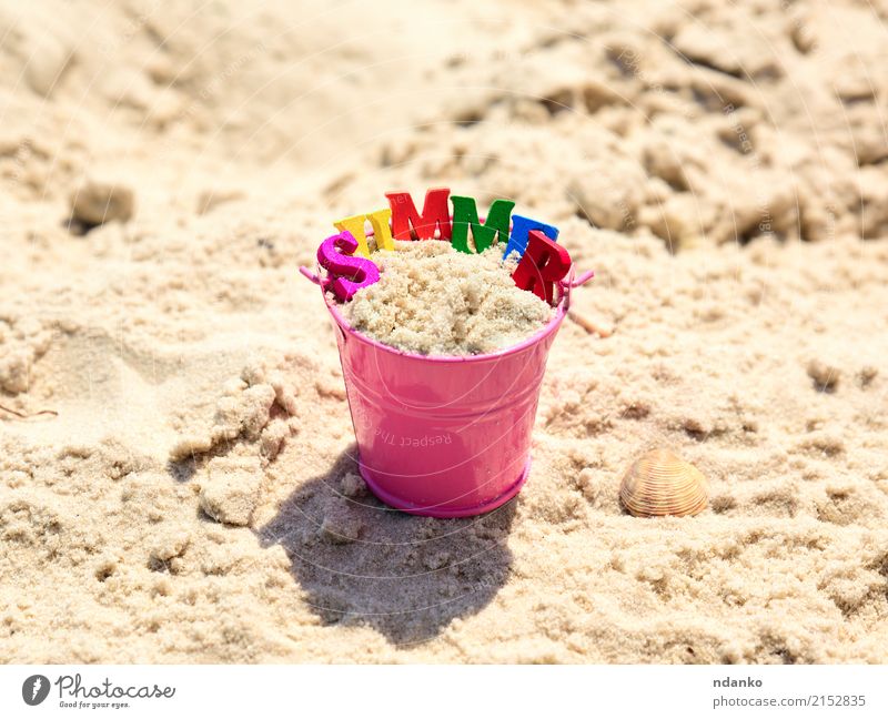 Pink baby bucket with sand Joy Relaxation Playing Vacation & Travel Trip Summer Sun Beach Ocean Child Nature Sand Coast Toys Wood Blue Yellow Conceptual design