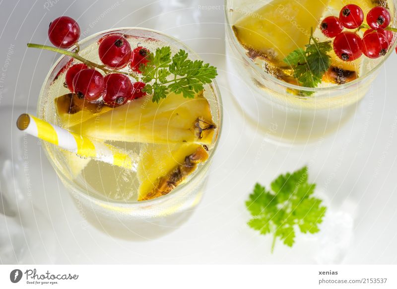 Cool refreshing drink with pineapple, currants and chervil Fruit Herbs and spices Pineapple Redcurrant Chervil Ice cube Beverage Cold drink Drinking water