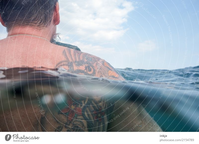 The man and the sea, cuddling. Lifestyle Style Harmonious Senses Relaxation Swimming & Bathing Leisure and hobbies Summer Summer vacation Ocean Waves Masculine