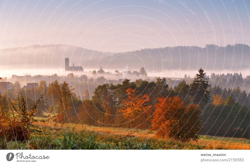 Tower of rural church in misty autumn colorful morning Vacation & Travel Tourism Trip Far-off places Sightseeing City trip Sun Mountain