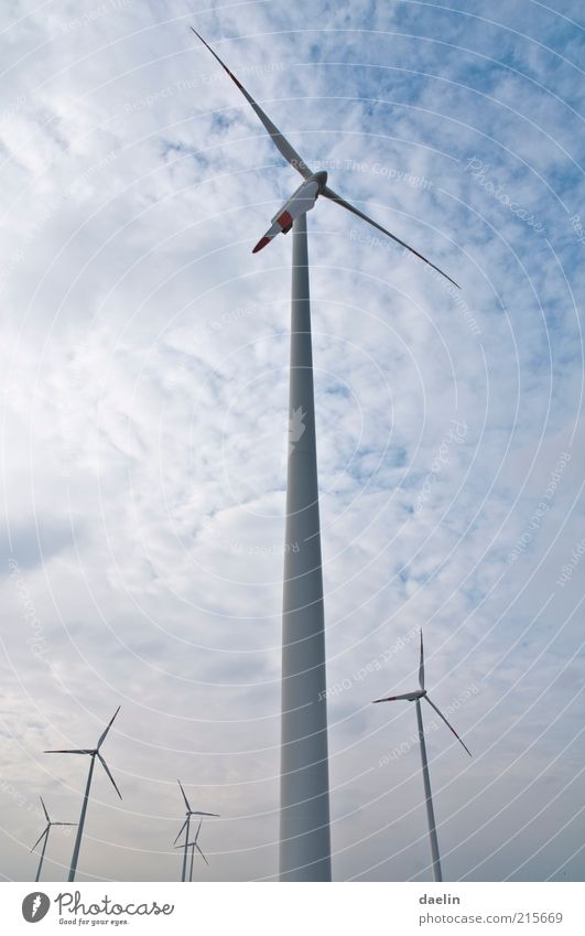 windmills Wind energy plant Blue Sky Clouds Clouds in the sky Rotor Generator Colour photo Worm's-eye view 6 Tall Deserted Steel construction Exterior shot