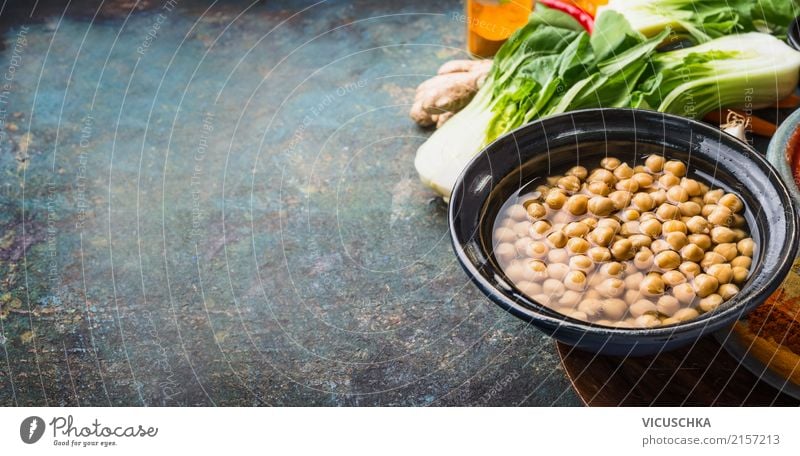 Chick peas in bowl with vegetarian cooking ingredients Food Vegetable Grain Herbs and spices Nutrition Organic produce Vegetarian diet Diet Crockery Bowl Style