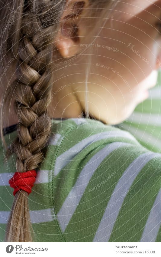 goat Hair and hairstyles Child Human being Girl Infancy Head 1 3 - 8 years Blonde Braids Sadness Green Emotions Frustration Boredom Sulk Striped Colour photo