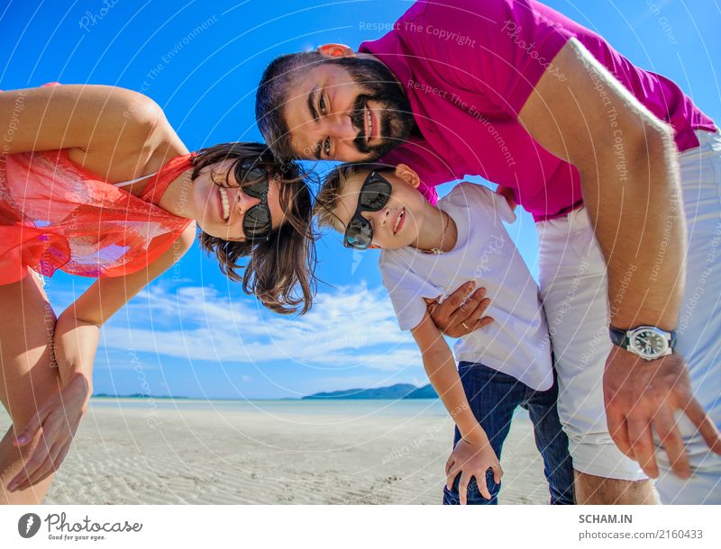 The happiest childhood: father, mother and son having fun on the tropical beach Lifestyle Joy Playing Summer Ocean Island Infancy Landscape Sunglasses Beard