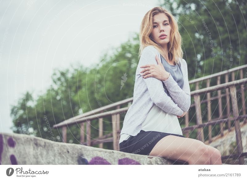 Young woman with beautiful body in a beach hut - a Royalty Free Stock Photo  from Photocase