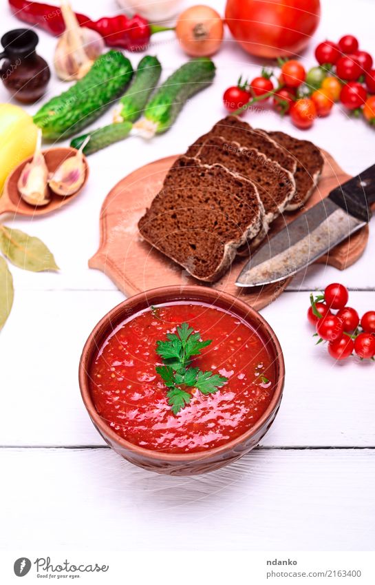 Gazpacho spanish cold soup Vegetable Bread Soup Stew Herbs and spices Nutrition Lunch Dinner Vegetarian diet Diet Plate Knives Summer Table Kitchen Wood Fat