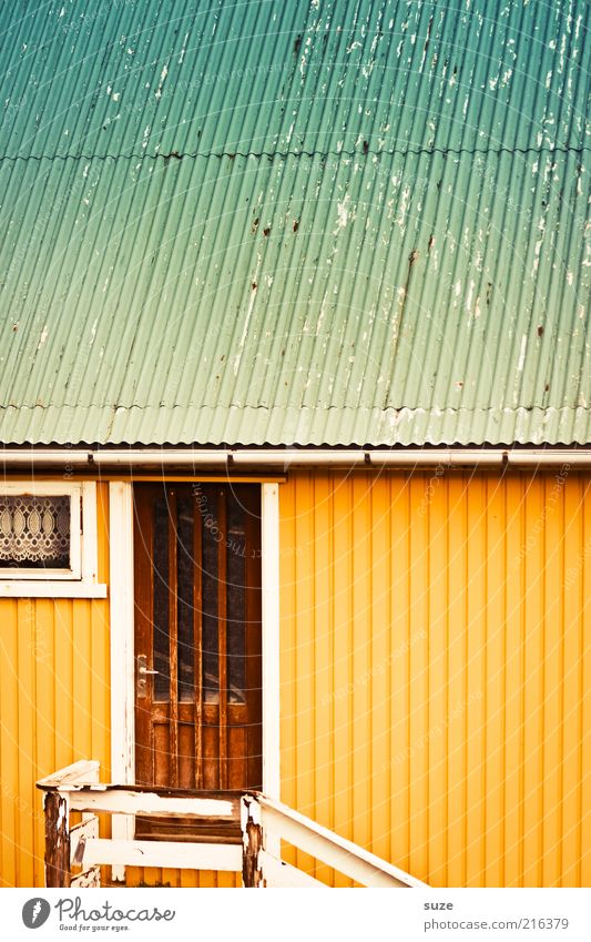 front door Living or residing Flat (apartment) House (Residential Structure) Hut Building Facade Door Roof Eaves Yellow Turquoise Føroyar Corrugated sheet iron