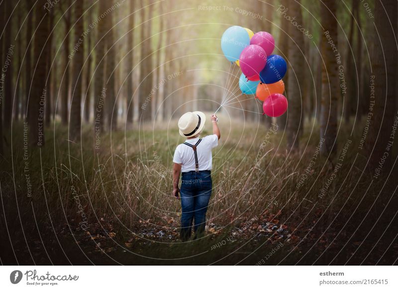 Child with balloons in the forest Lifestyle Trip Adventure Freedom Human being Toddler Infancy 1 3 - 8 years Nature Forest Globe Vacation & Travel Dream Cuddly