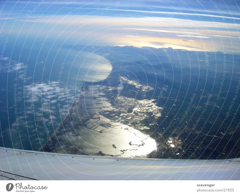 Costa Blanca from above Ocean Air Aerial photograph Clouds Fog Horizon Vantage point Beautiful Wing Long Far-off places Sunrise Landscape Mountain Wide Water