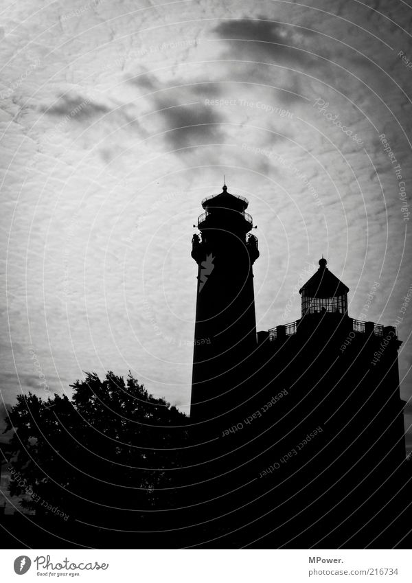 signpost Tower Lighthouse Manmade structures Building Architecture Tourist Attraction Landmark Monument Old Famousness Large Black White Clouds in the sky