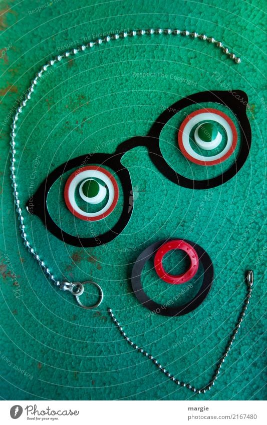 emotions...cool faces: collage face with necklace and glasses Business Human being Masculine Man Adults Face 1 Green Black Dedication Modest Eyeglasses Eyes