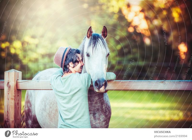 Young man hugging a horse Lifestyle Joy Leisure and hobbies Summer Winter Equestrian sports Human being Masculine Youth (Young adults) Nature Animal Horse Love