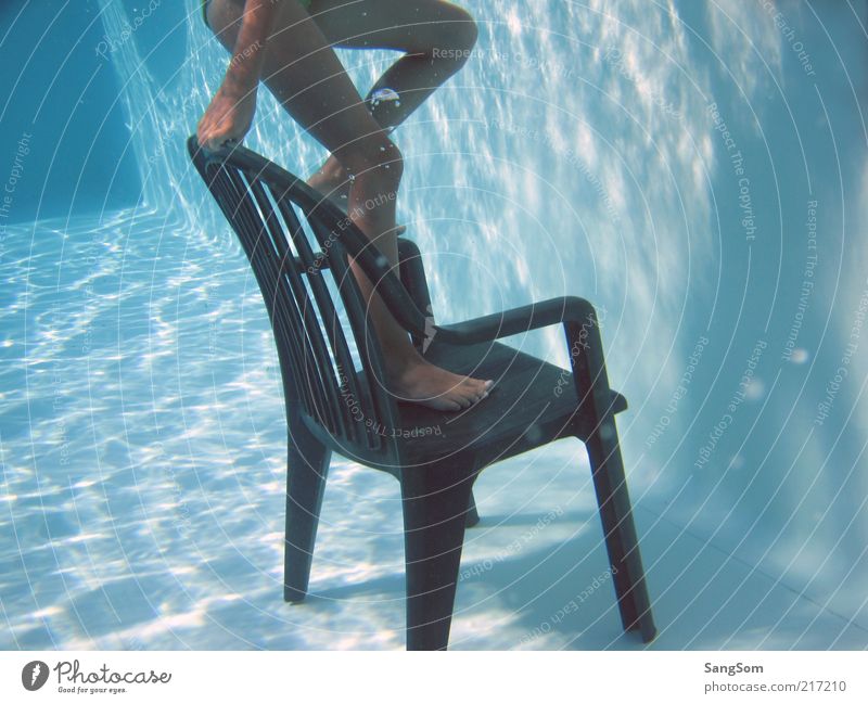 the chair in the pool Summer Chair Child Girl Skin Legs 1 Human being Water Plastic Movement Wet Blue Joy Idea Visual spectacle Breathe in Swimming & Bathing