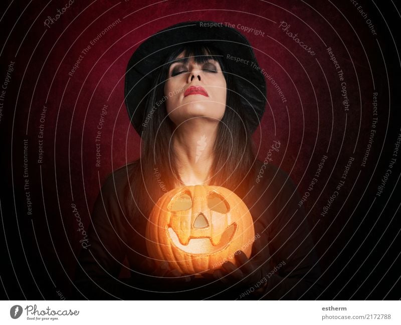 Beautiful woman like witch with pumpkin Lifestyle Feasts & Celebrations Carnival Hallowe'en Human being Feminine Young woman Youth (Young adults) Woman Adults 1