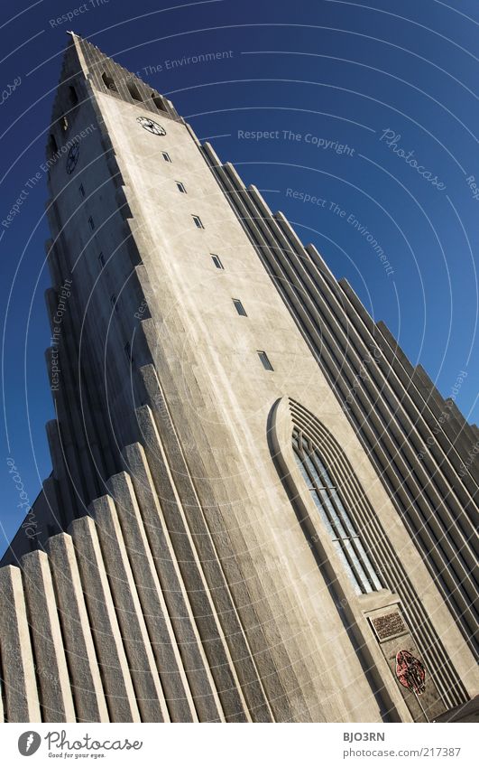 The light does it. Iceland. Sky Cloudless sky Beautiful weather Capital city Church Architecture Tourist Attraction Stone Concrete Modern Blue