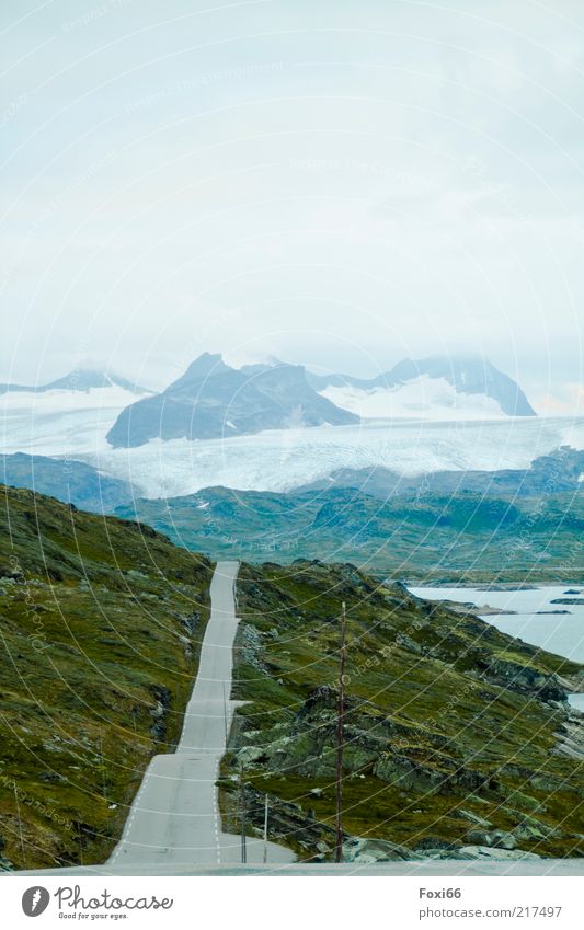 Road to loneliness Mountain Nature Landscape Plant Air Water Summer Fog Moss Rock Glacier Deserted Traffic infrastructure Stone Concrete Blue Green White