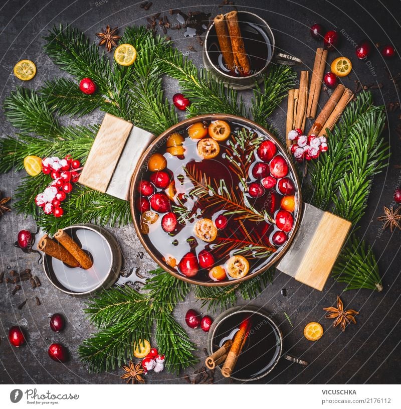 Mulled wine in a pot with cups and ingredients Food Herbs and spices Beverage Hot drink Alcoholic drinks Wine Pot Cup Style Design Winter Living or residing