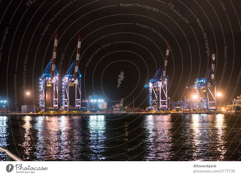 Cranes in the port of Genoa Italy Europe Genua Port City Harbour Container terminal Deserted Apartment Building Lighting Night Lamp Illuminate Water