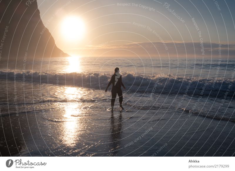 Young woman in the North Sea at sunset Harmonious Well-being Contentment Senses Relaxation Vacation & Travel Summer vacation Beach Ocean Waves