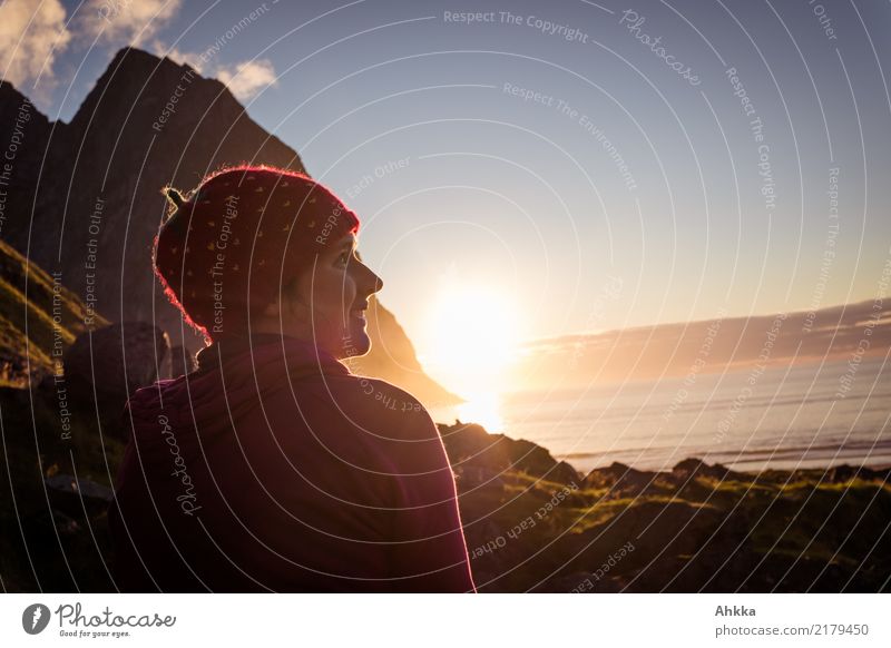 Young woman in strawberry cap enjoys sunset Harmonious Well-being Contentment Relaxation Calm Vacation & Travel Adventure Far-off places Youth (Young adults)