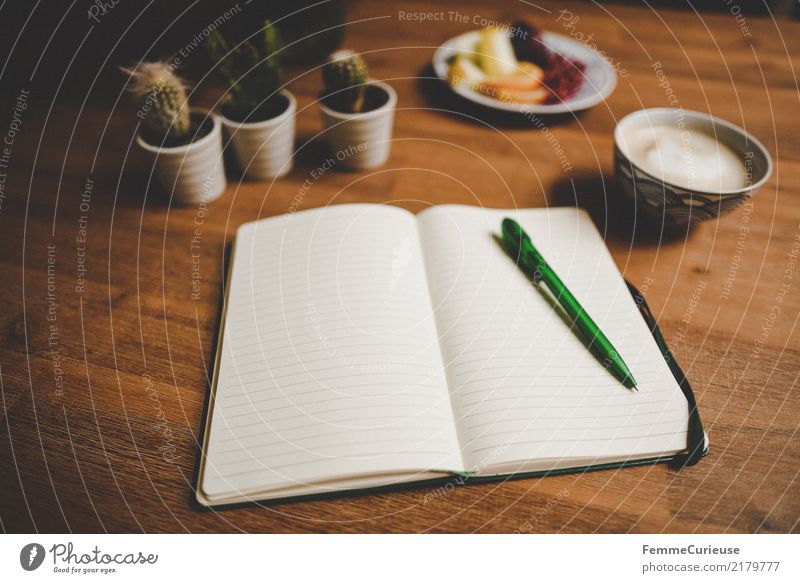 Home_24 Lifestyle Living or residing Wooden table Living room Notebook Ballpoint pen Tabletop Cactus Cappuccino fruit plate Fruit Write Document Lined Cozy