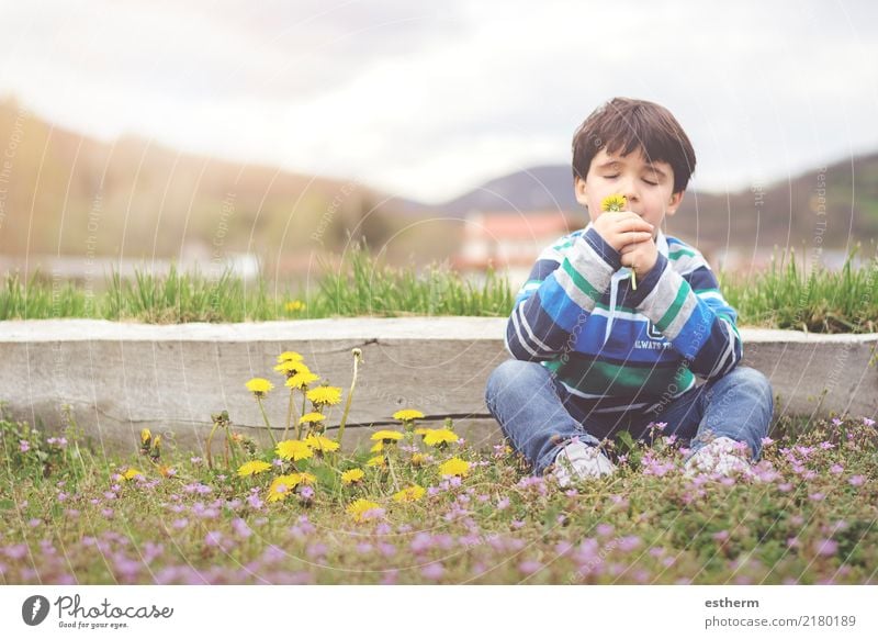 Happy child with flowers in spring Lifestyle Joy Wellness Vacation & Travel Adventure Freedom Human being Masculine Child Toddler Boy (child) Infancy 1