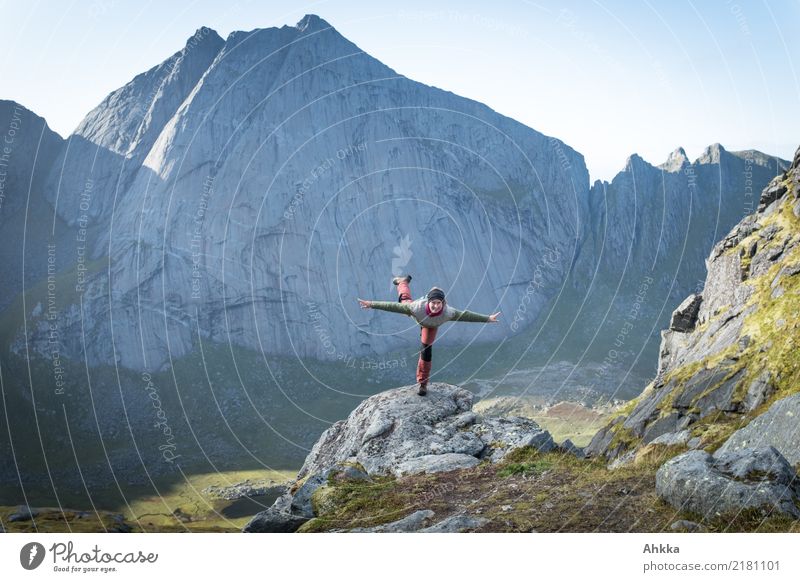 Young woman tries flying in Scandinavian mountain landscape Playing Vacation & Travel Adventure Far-off places Freedom Youth (Young adults) Nature Elements