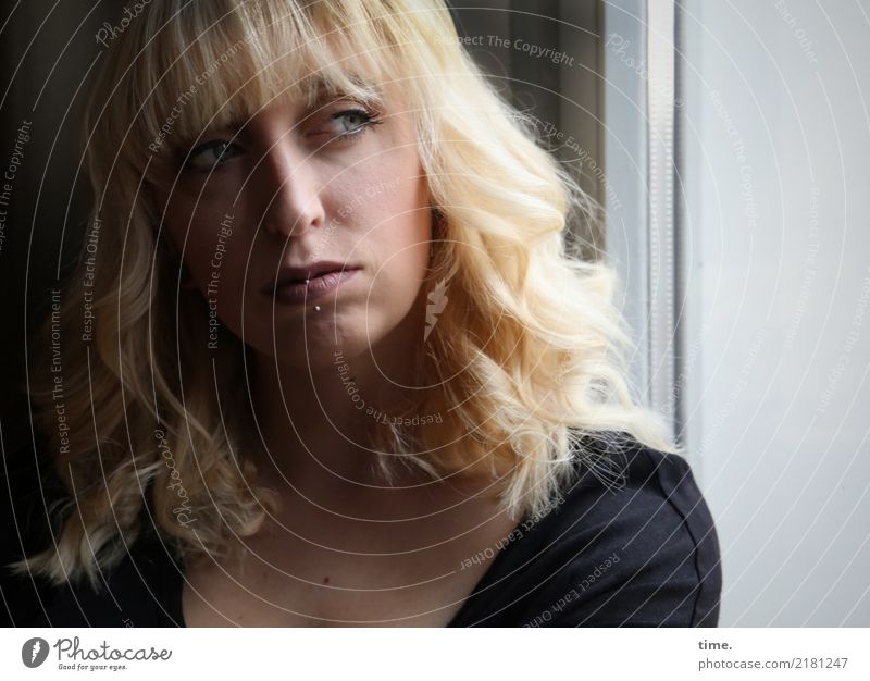 . Room Feminine Woman Adults 1 Human being Window Shirt Piercing Blonde Long-haired Bangs Observe Think Looking Dark Beautiful Cool (slang) Optimism Willpower