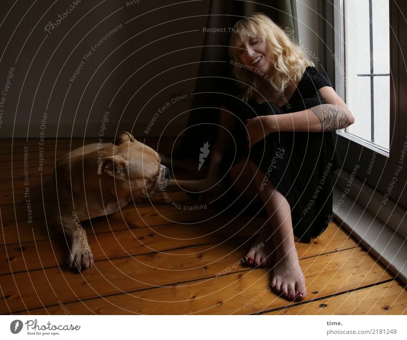 Lilly Room Wooden floor Feminine Woman Adults 1 Human being T-shirt Pants Tattoo Barefoot Blonde Long-haired Animal Dog Bulldog Relaxation Laughter Sit Playing