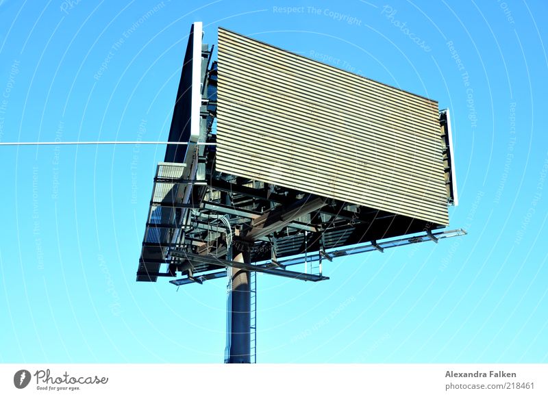 In all directions. Signs and labeling Advertising Display Colour photo Deserted Copy Space left Copy Space top Neutral Background Day Sunlight Billboard