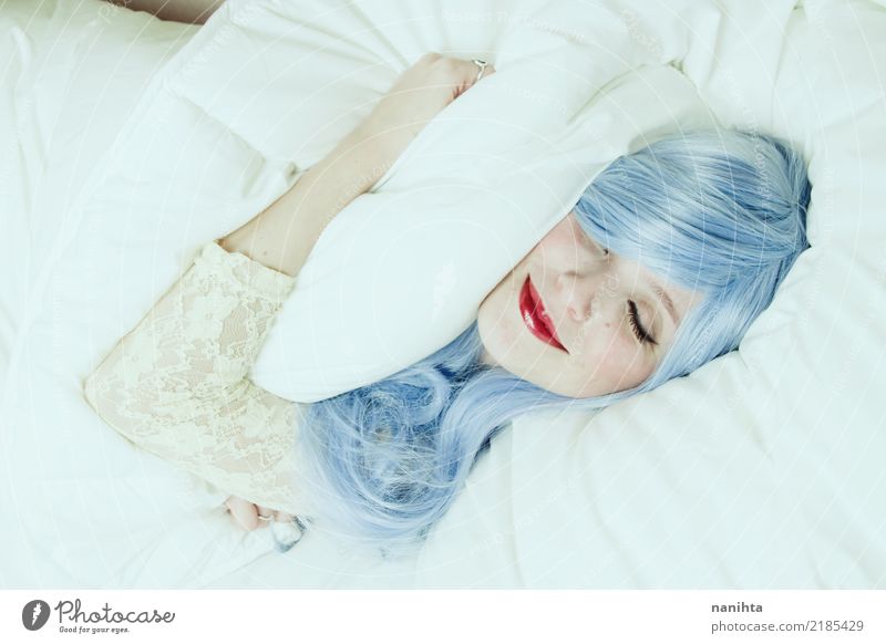 Young woman smiling in dreams and hugging a pillow Lifestyle Joy Beautiful Face Lipstick Bed Bedroom Human being Feminine Youth (Young adults) 1 18 - 30 years