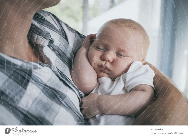 Father holding newborn baby son at the day time. Concept of happy family. Lifestyle Joy Happy Relaxation Leisure and hobbies Playing Vacation & Travel Freedom