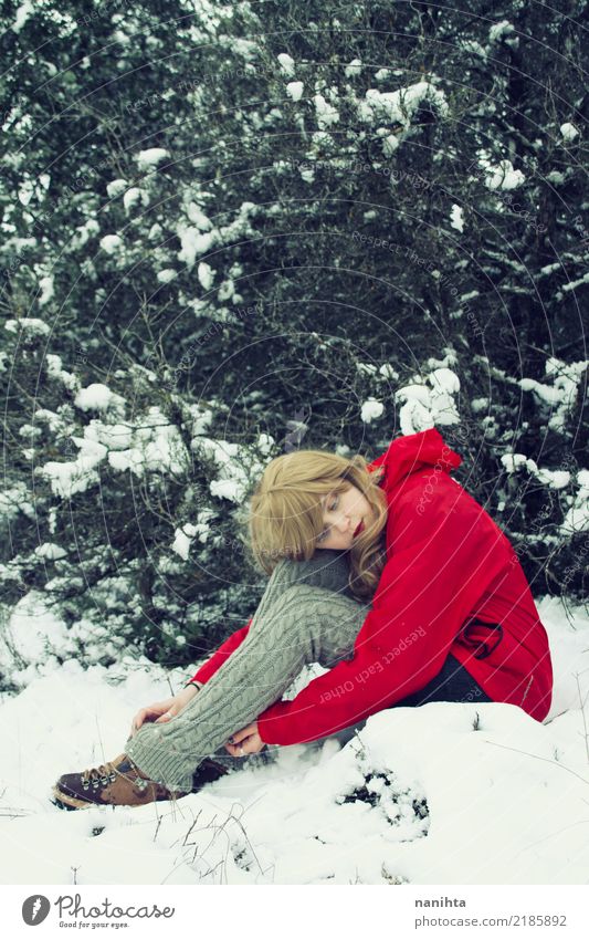 Young blonde woman lost in a snowy forest Lifestyle Vacation & Travel Adventure Far-off places Freedom Expedition Winter Snow Winter vacation Hiking Human being