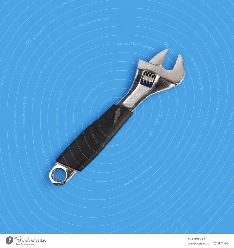 Wrench isolated over blue background wrench tool Mechanic Fix metal shine wallpaper