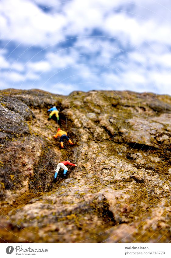 Rock climbers Fitness Sports Training Climbing Mountaineering Masculine Beautiful weather Exceptional Freedom Manikin Tilt-Shift Colour photo Multicoloured