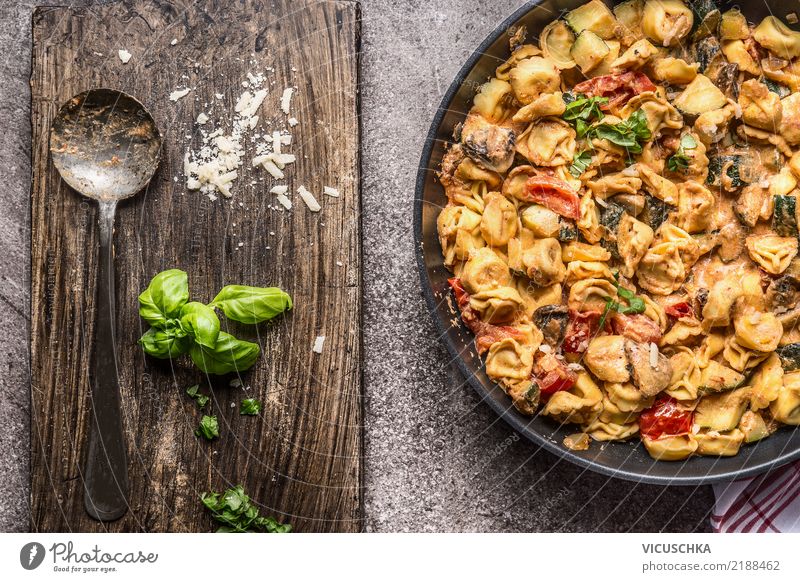 Tortellini pan with vegetable sauce and spoon Food Vegetable Dough Baked goods Nutrition Lunch Dinner Banquet Organic produce Diet Italian Food Crockery Pan