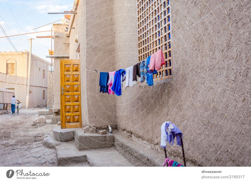 Laundry drying, Khiva, Uzbekistan Style Design Tourism House (Residential Structure) Decoration Art Town Old town Architecture Street Ornament Large Colour